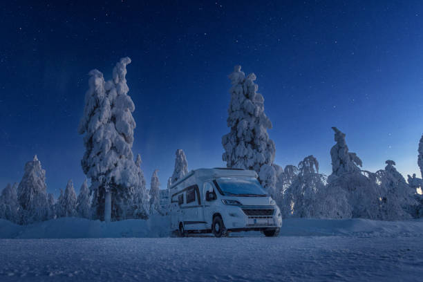 the camper in the beautiful place and winter night landscape, finland